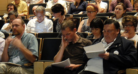 Conference participants formulating questions